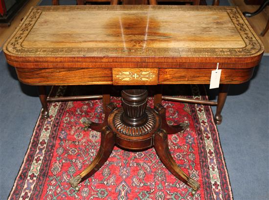 A Regency brass inset rosewood card table, W.92cm